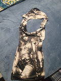 Black and white mini dress with hoodie styles throw over  deeb cleavage.