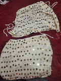 Mini cream skirt suit with gold design ,